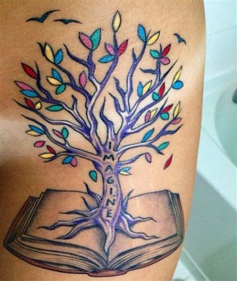 Colorful tree and book tattoo