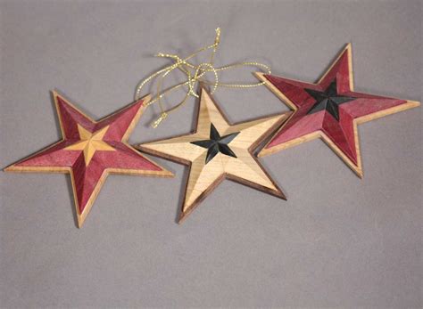 carved wooden star Christmas ornaments