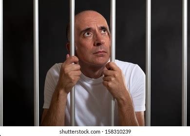 Desperate Sad Man Behind Bars Stock Photo 158310239 | Shutterstock