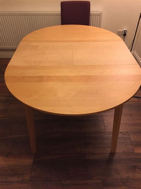 Round Extendable Dining Table Set Ikea Rugs : Round extending dining table. Ikea Bjursta in ...