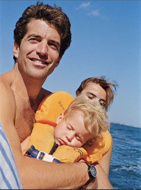 Does someone know who child is this in JFK jr. arms?