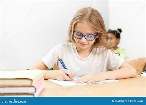 Studious Man Writing On His Notebook On The Table. Stock Photography ...