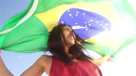 Cheerful girl from brazil with brazilian flag — Stock Video ...