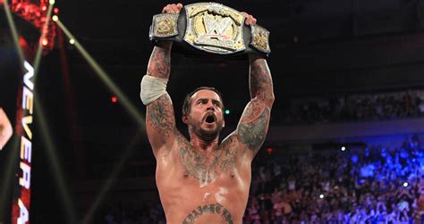 WWEevolutuion: CM Punk reaches 1 Year of being WWE Champion!