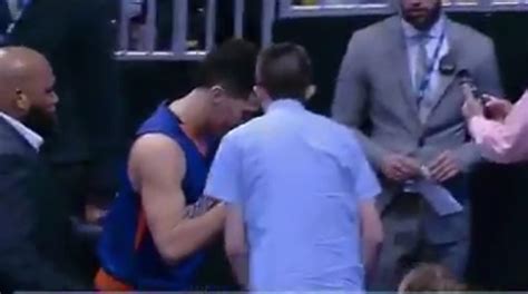 Devin Booker gives fan autograph after ejection (Video)