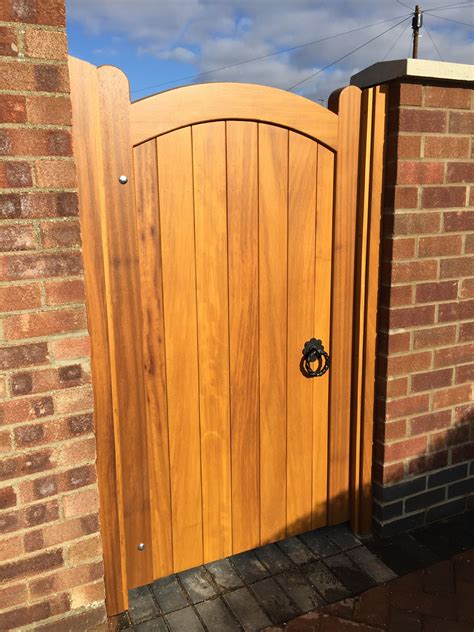 Pedestrian Iroko Gate in Lincolnshire. Stained spray finish with Black premium ironmongery ...