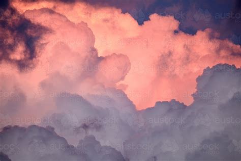 Image of Pink fluffy clouds - Austockphoto