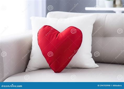 Single Red Heart-shaped Pillow on a Minimalist White Couch Stock Photo - Image of generative ...
