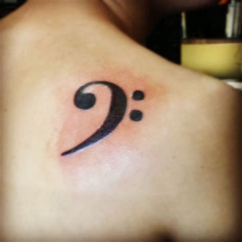 Music is everything to me. This is my bass clef tattoo. Oh, by the way ...