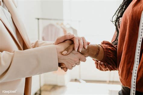 Two women shaking hands in a boutique | premium image by rawpixel.com ...