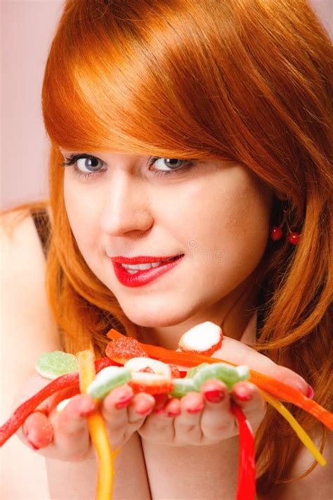 Redhair Girl Holding Sweet Food Jelly Candy on Pink. Stock Image - Image of pink, hair: 71054913