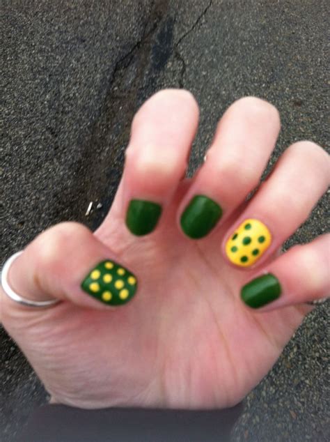Green Bay Packers nails - Like the polka dots | Green bay packers nails, Packer nails, Tape nail art