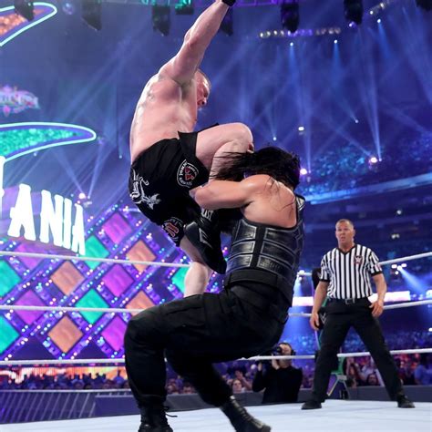 Photos: Lesnar and Reigns throw down in brutal WrestleMania battle | Brock lesnar, Roman reigns ...