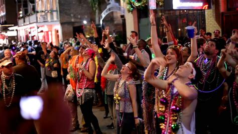 NEW ORLEANS - FEBRUARY 18: Bourbon Street Crowd Handheld Shot During ...