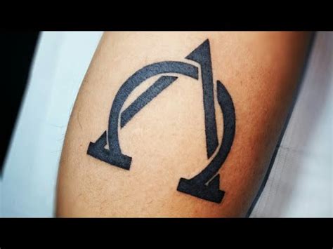 Alpha Symbol Tattoo