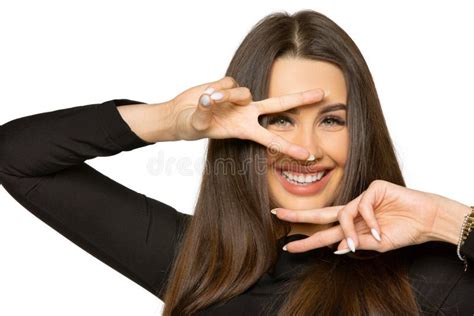 A Young Woman Smiles and Poses in the Studio. Stock Image - Image of fingers, caucasian: 171433781