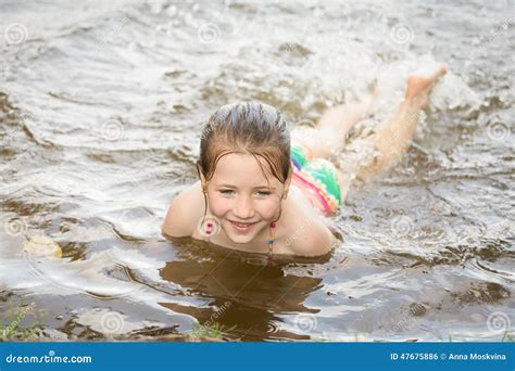 Pretty Nice Little Girl Swimming in Lake Stock Photo - Image of play, lifestyle: 47675886