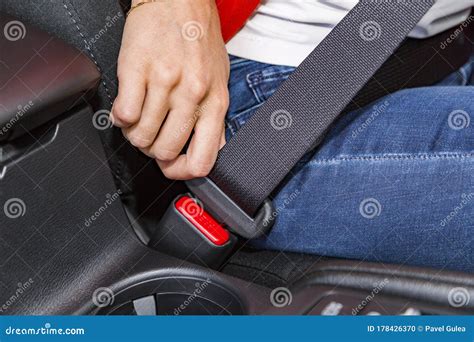 Close Up Female Hand Fasten Seat Belt in Car Stock Photo - Image of future, click: 178426370