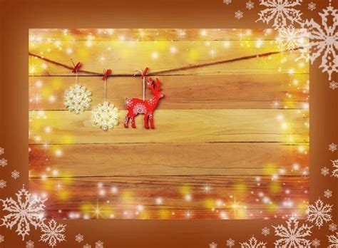 Reindeer and snowflakes on a wooden background. Christmas. rusti - Stock Image - Everypixel