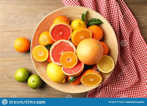 Different Citrus Fruits on Wooden Table, Top View Stock Photo - Image of concept, view: 242177144