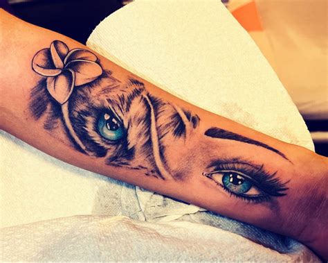 Tiger and woman’s eye tattoo | Eye tattoo, Realistic eye tattoo, Tiger eyes tattoo