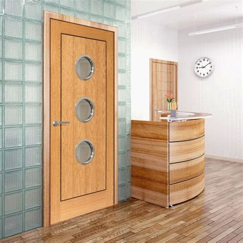 Pin op Office door with glazed portholes.