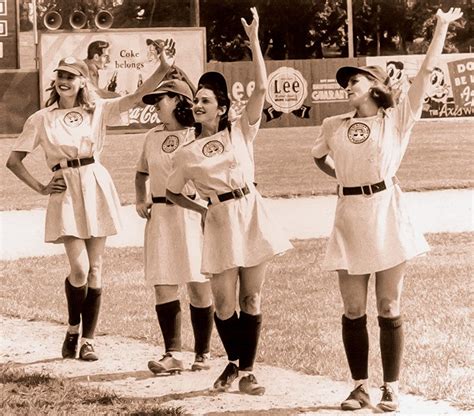 Rockford Peaches teammates Dottie Hinson (Geena Davis), Doris Murphy (Rosie O’Donnell), Mae ...