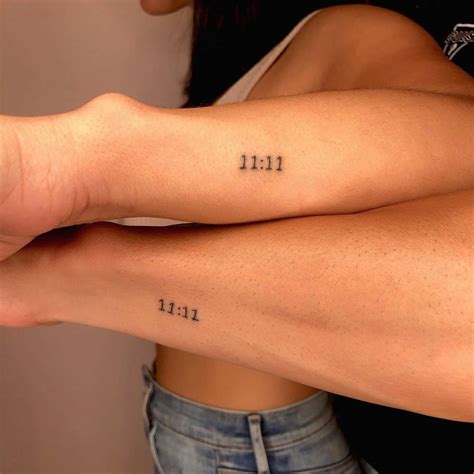 "11:11" matching tattoo for couple.