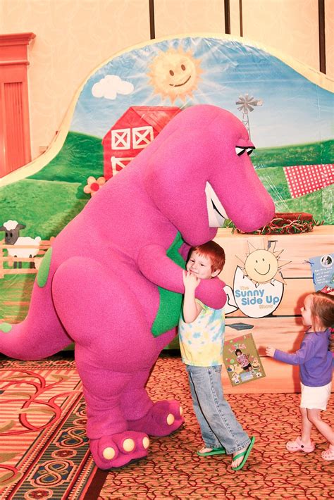 Barney, The Purple Dinosaur | Barney hugs a little boy. | Flickr