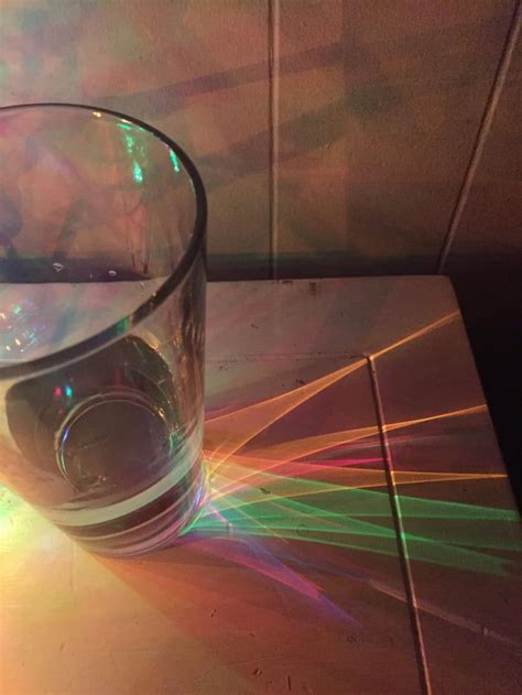 My Christmas lights refracting through my glass of water Reflection And ...