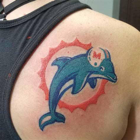 Dolphins Tattoo by @tatutomrock #miamidolphins #miamidolphinstattoo #colortattoo # ...