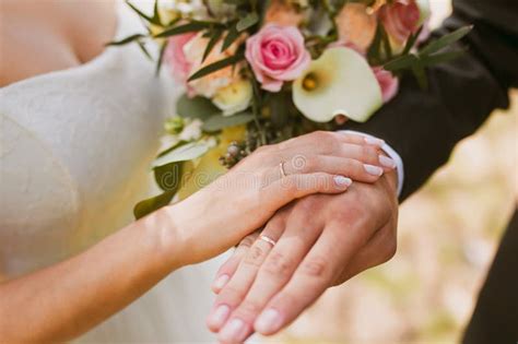 Couple hands on wedding stock image. Image of ceremony - 74537051