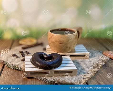 Wooden Cup on the Oak Table Stock Image - Image of card, latte: 211386039