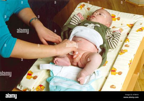 Changing babys nappy Stock Photo: 1684503 - Alamy