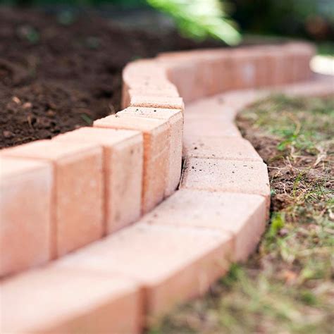 How to Plant A Curved Brick Flowerbed Border | Brick garden edging ...