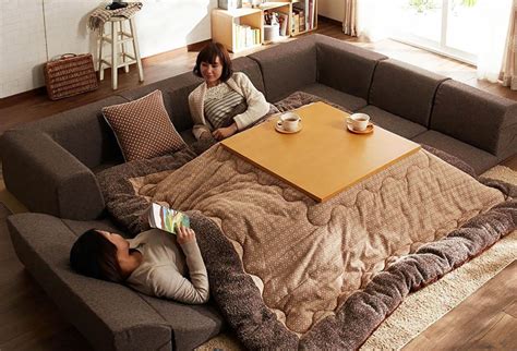 Slay winter with a heated Kotatsu table bed from Japan