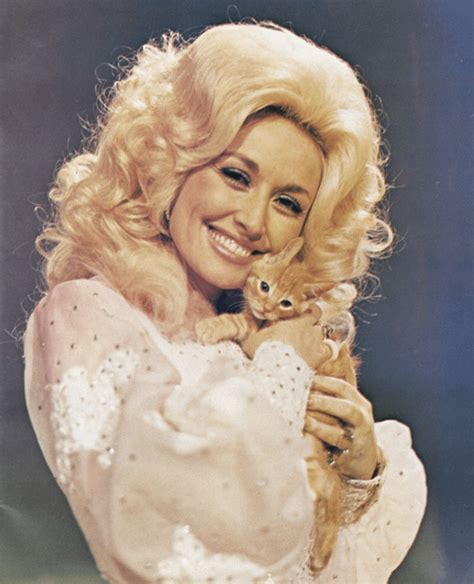 Dolly Parton holding a Kitten, 1970s. : r/aww