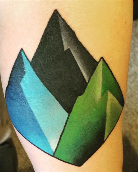 Mountain tattoo. Colors symbolize snowboard/ski difficulty | Tattoos, Leaf tattoos, Mountain tattoo