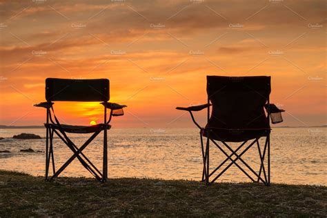 Chairs at the beach on sunset | Abstract Stock Photos ~ Creative Market