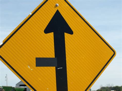 Some road signs are just straight arrows with tape. : mildlyinteresting