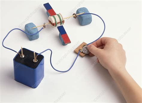 Experiment using electric motors and magnetism - Stock Image - C053 ...