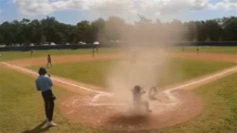 Dust devil disrupts youth baseball game. See what happens next | CNN