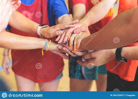 Team of Kids Children Basketball Players Stacking Hands in the Court, Sports Team Together ...