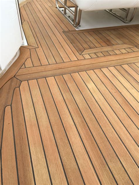 New teak decking cockpit on Fountain go fast boat | Boat flooring ideas, Teak flooring, Boat ...