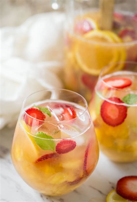 This pineapple strawberry sangria is a perfect non-alcoholic summer drink to enjoy fresh ...