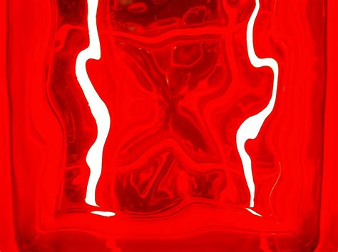 Red tile | Glass block tile with red neon light behind it. | Geoffrey Gallaway | Flickr