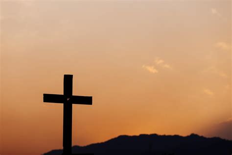 Silhouette of cross on mountain at sunset. concept of religion. 8034961 Stock Photo at Vecteezy