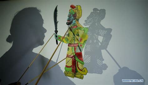 Artist presents traditional shadow puppet plays for free in E China's Shandong - Xinhua ...