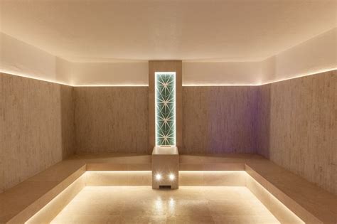 Pennyhill Park Hotel & Spa | Spa design, Feature tiles, Log wall