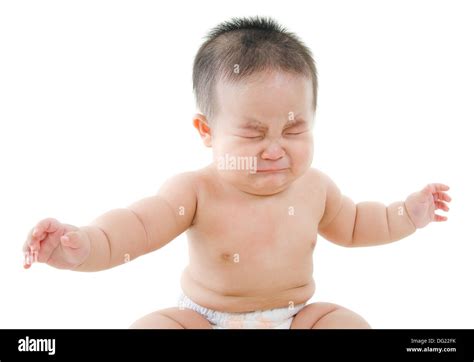 Upset Asian baby boy crying, sitting isolated on white background Stock Photo - Alamy